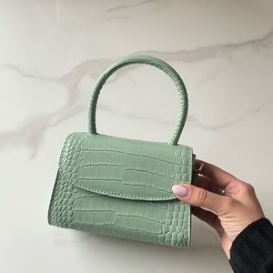 Mint green mini crocodile print bag